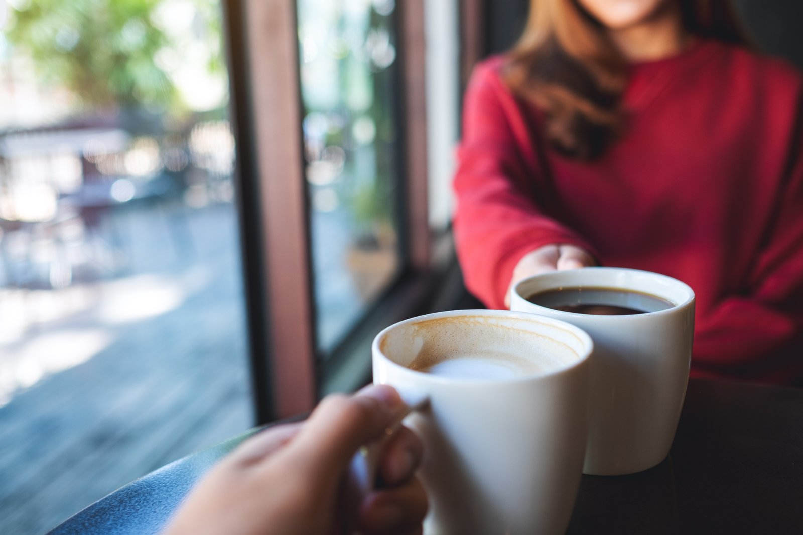 two friends enjoying tea together