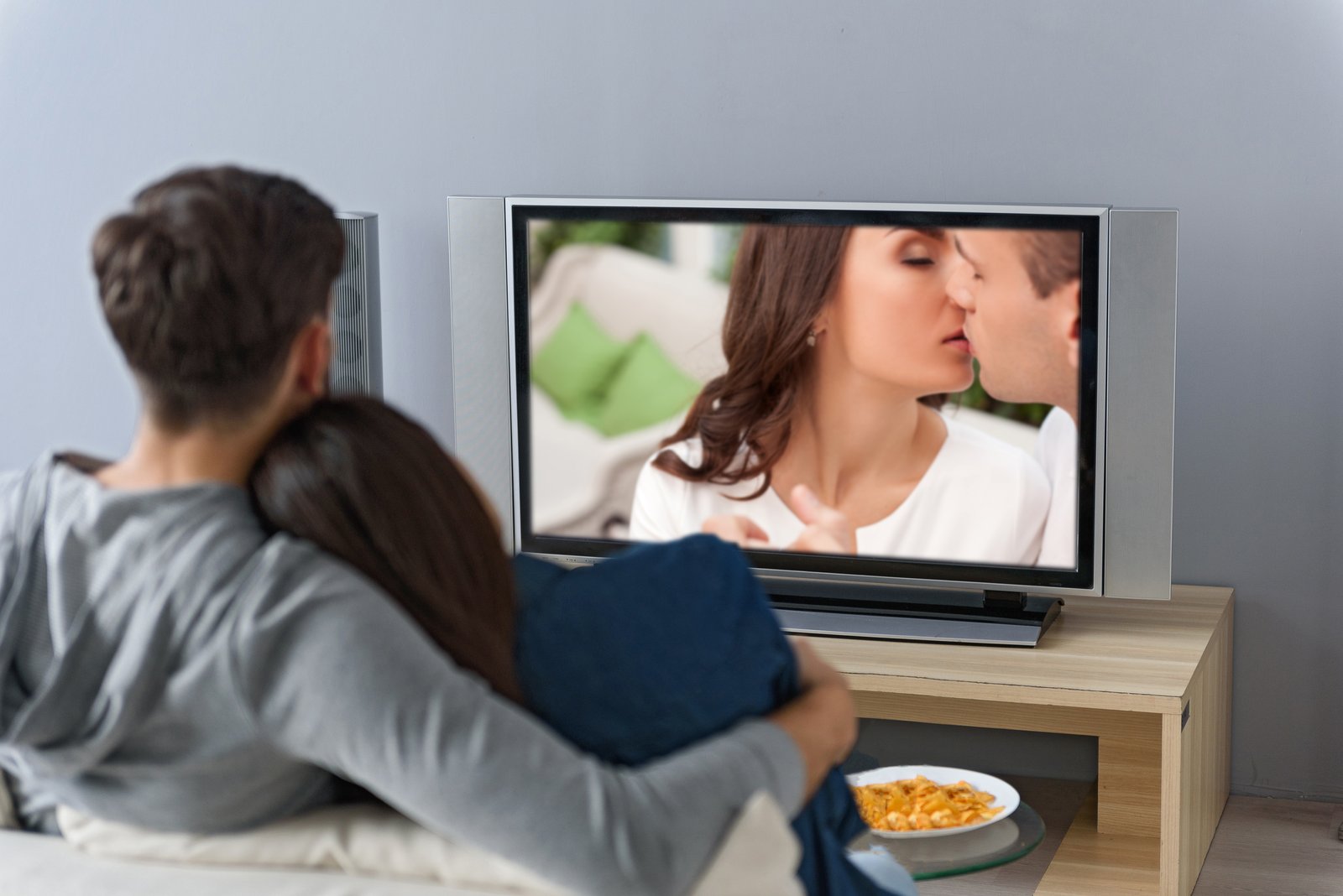 Couple watching Tv shows together