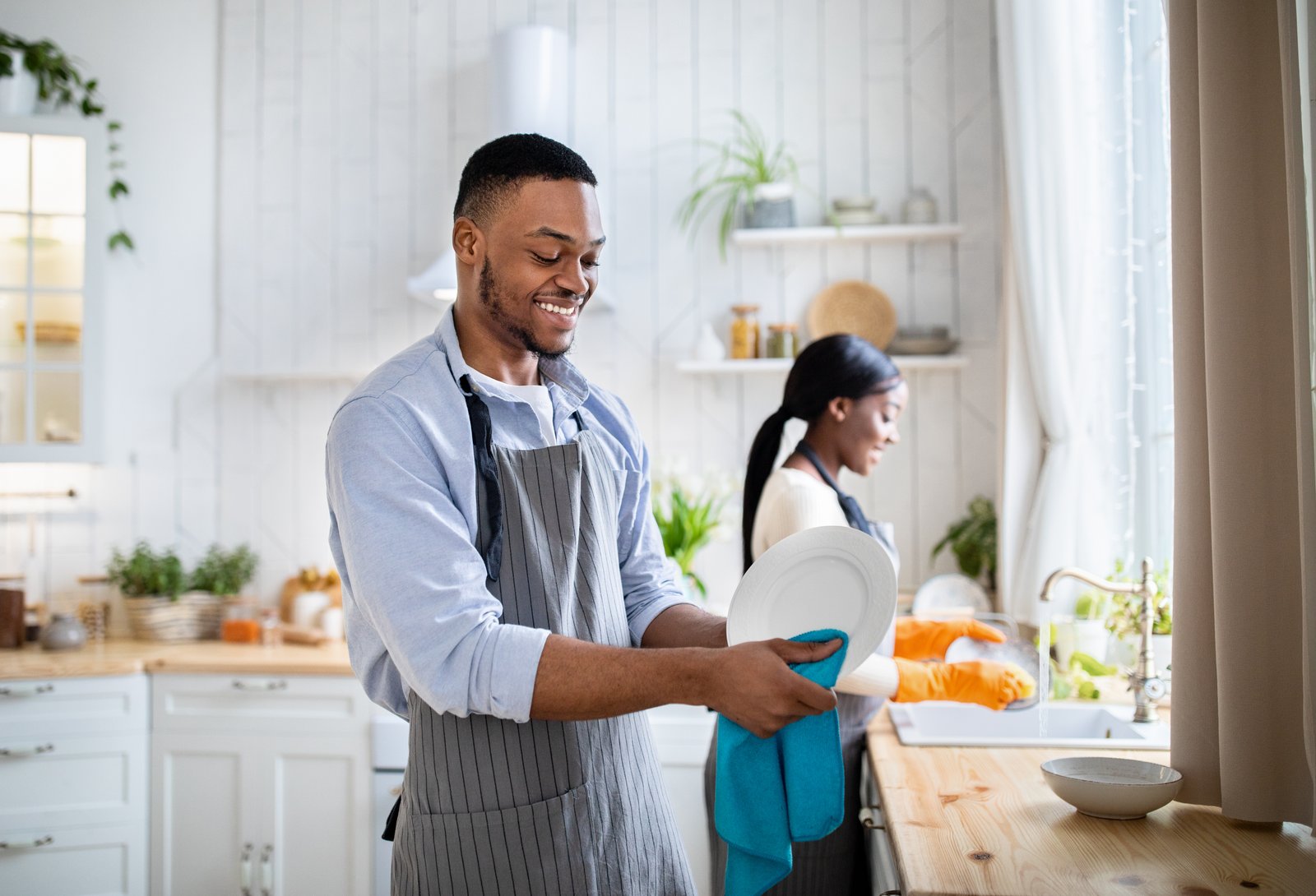 Couple doing dishes together